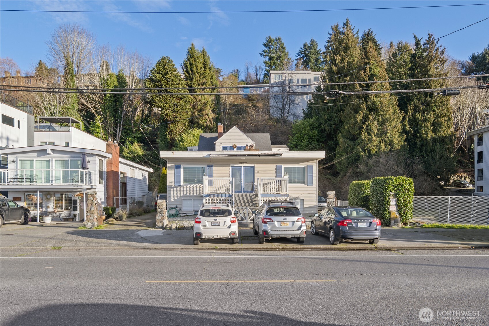 1788 Alki Avenue Southwest Seattle, WA 98116 - Photo 2 of 38 a car parked on the side of a street
