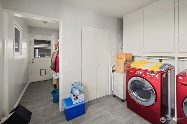 a view of a livingroom with furniture and a fireplace