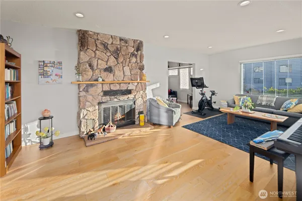 a swimming pool with outdoor seating and yard