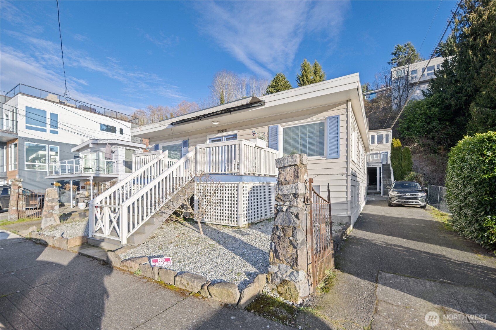 1788 Alki Avenue Southwest Seattle, WA 98116 - Photo 4 of 38 a front view of a house with a tree