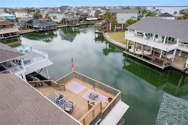 an aerial view of a house with a outdoor space