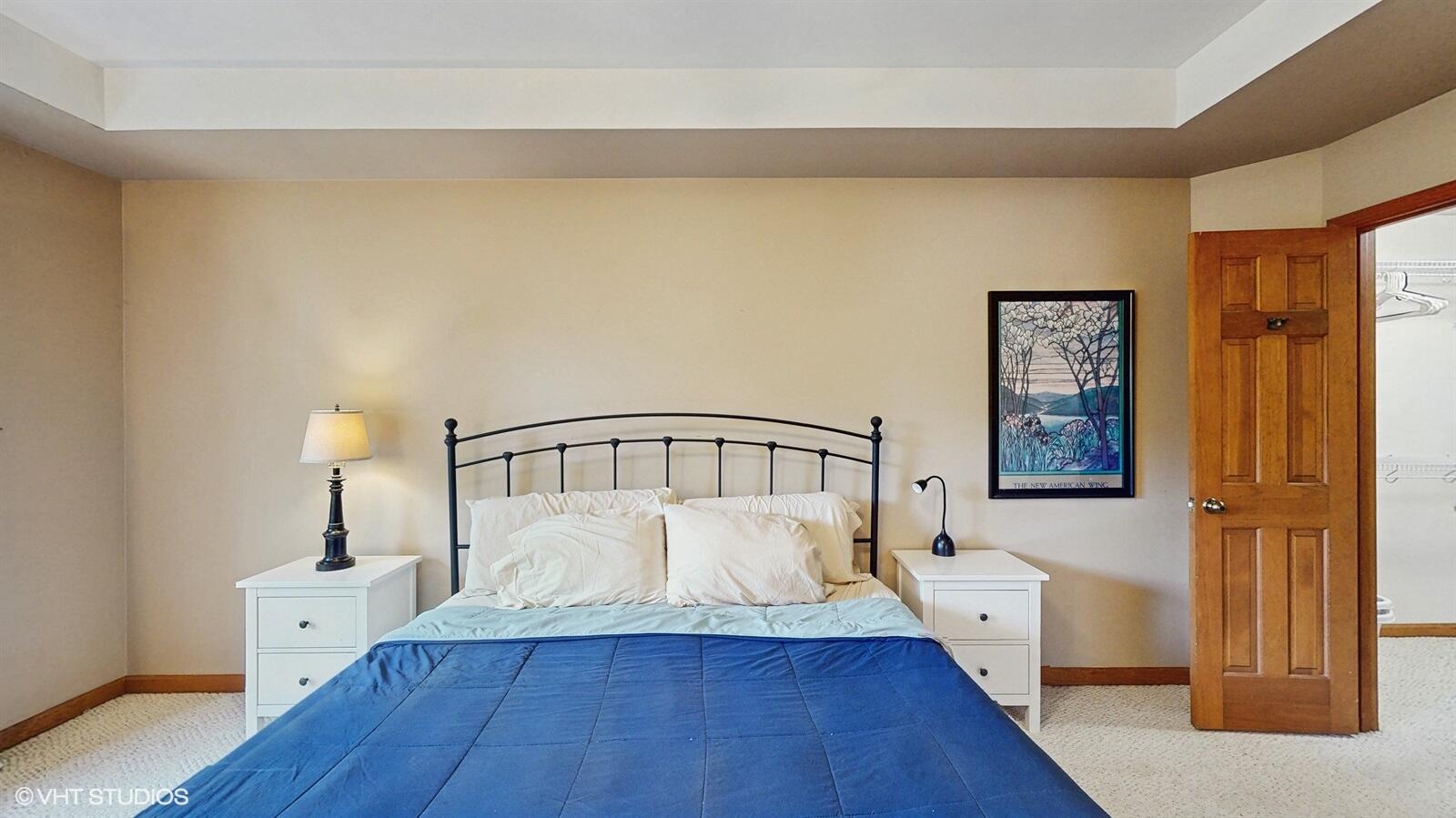 3908 Autumn Lane Valparaiso, IN 46385 - Photo 14 of 29 a view of a bedroom with wooden floor and a bed