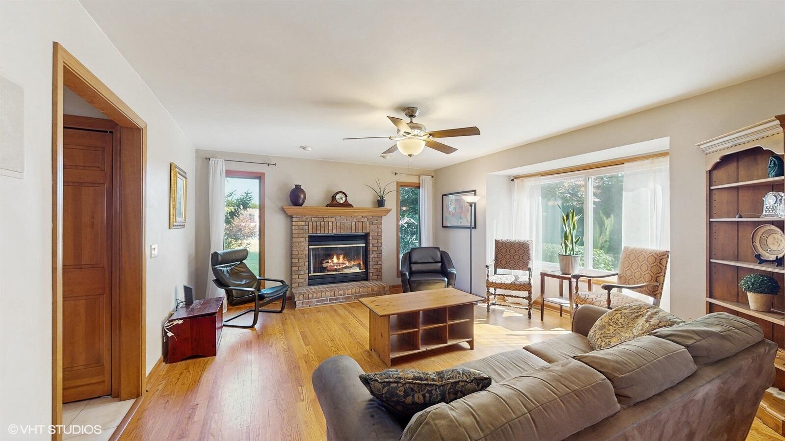 3908 Autumn Lane Valparaiso, IN 46385 - Photo 2 of 29 a living room with furniture and a fireplace