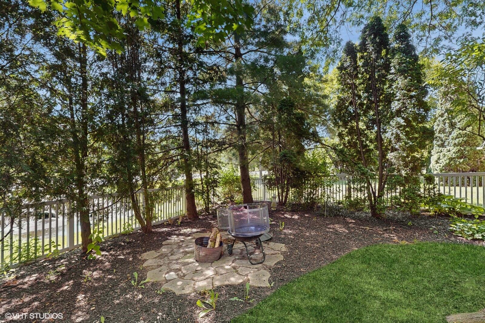 3908 Autumn Lane Valparaiso, IN 46385 - Photo 25 of 29 a view of a bench in a garden