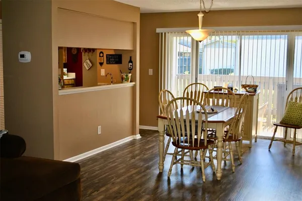 a view of a livingroom with furniture and window