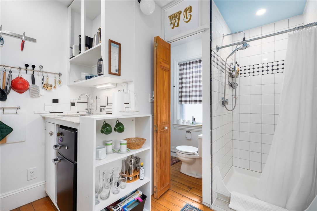 56 Ivy Street Providence, RI 02906 - Photo 10 of 43 first floor art studio with efficiency kitchen and full bath.