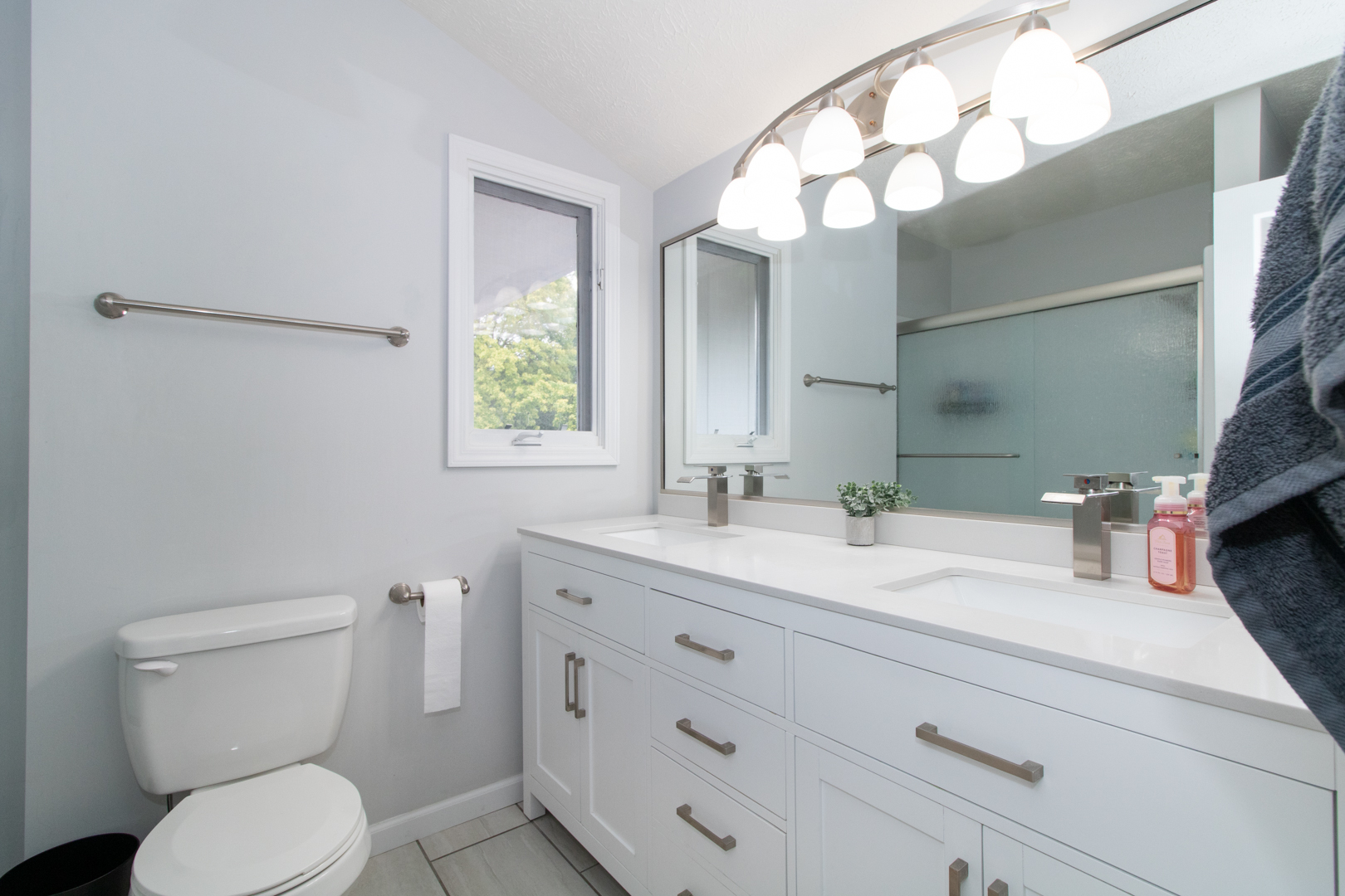211 Sandra Lane Normal, IL 61761 - Photo 14 of 44 a bathroom with a granite countertop toilet sink and mirror