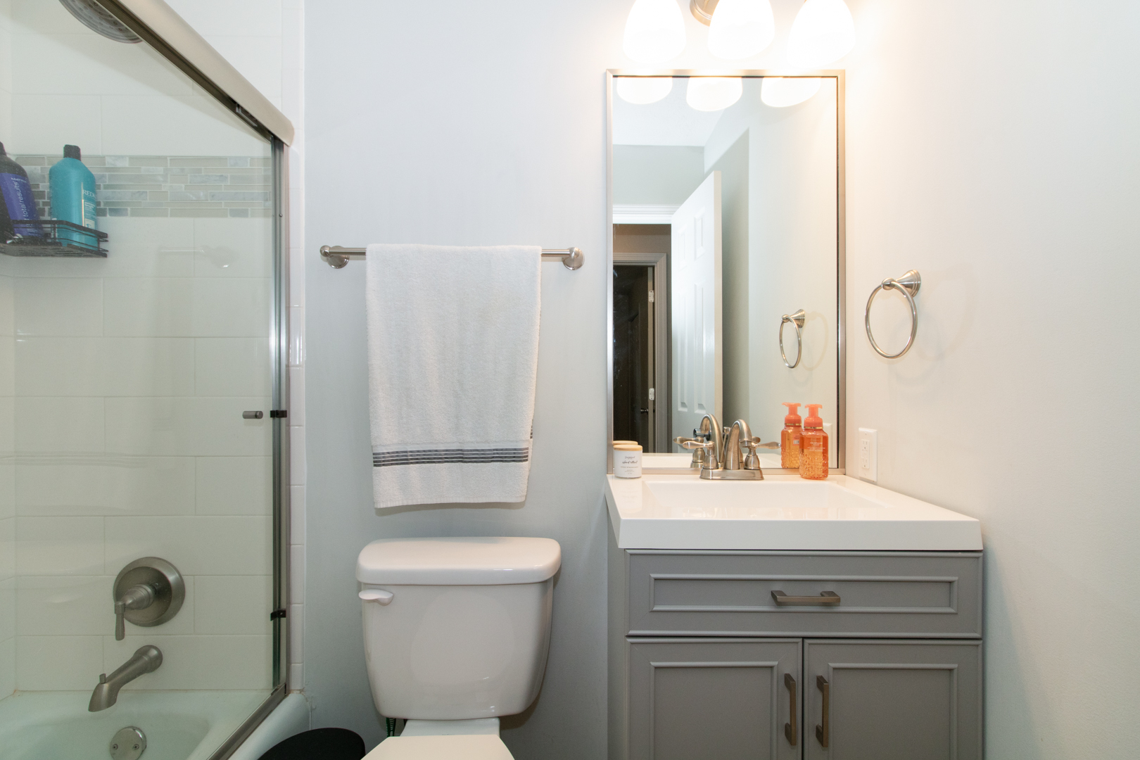 211 Sandra Lane Normal, IL 61761 - Photo 20 of 44 a bathroom with a sink toilet and shower
