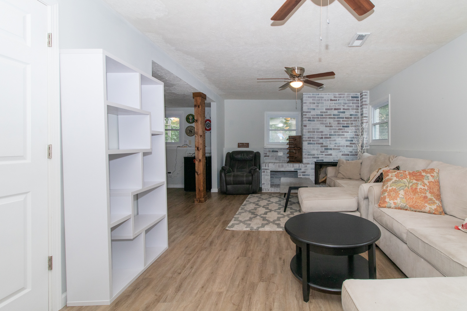 211 Sandra Lane Normal, IL 61761 - Photo 23 of 44 a living room with furniture and a fireplace