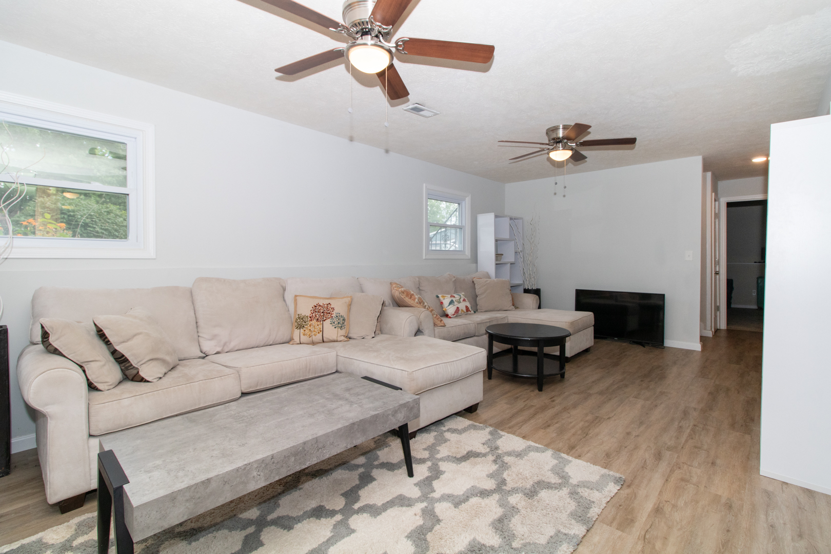 211 Sandra Lane Normal, IL 61761 - Photo 24 of 44 a living room with furniture and a fireplace