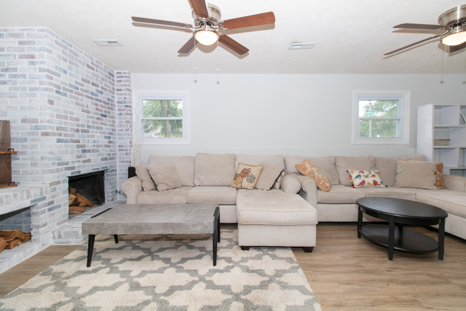 211 Sandra Lane Normal, IL 61761 - Photo 25 of 44 a living room with furniture and a fireplace