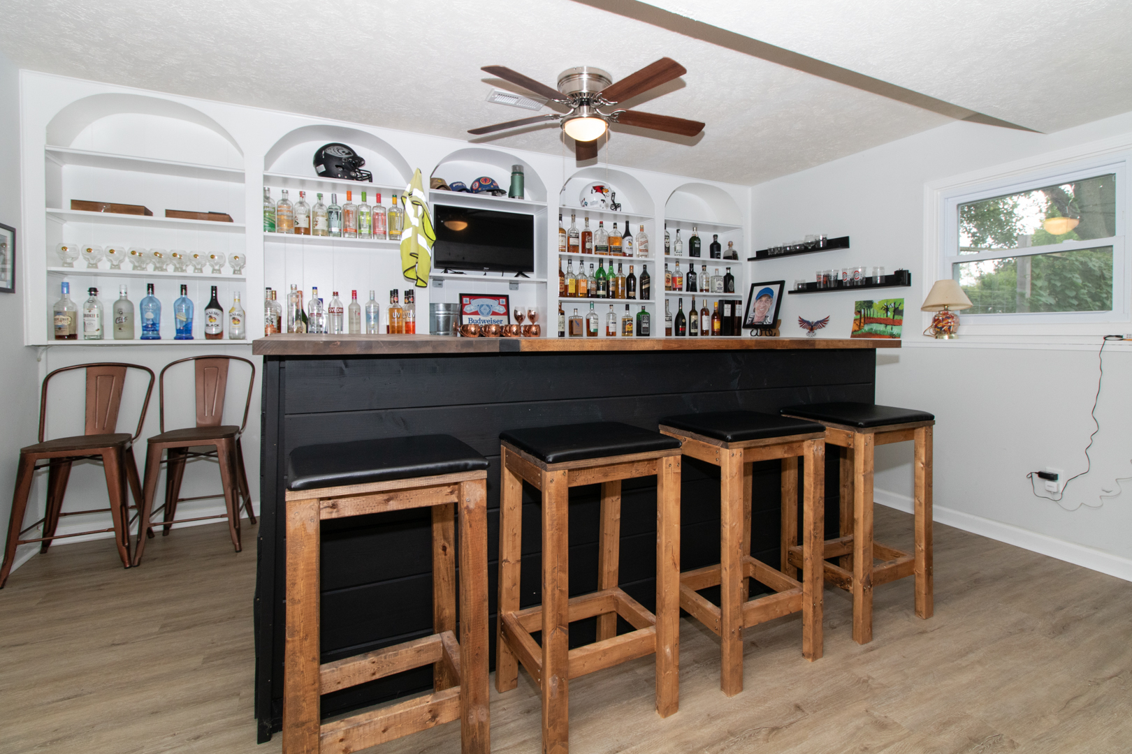 211 Sandra Lane Normal, IL 61761 - Photo 30 of 44 a living room with furniture a fireplace and a table