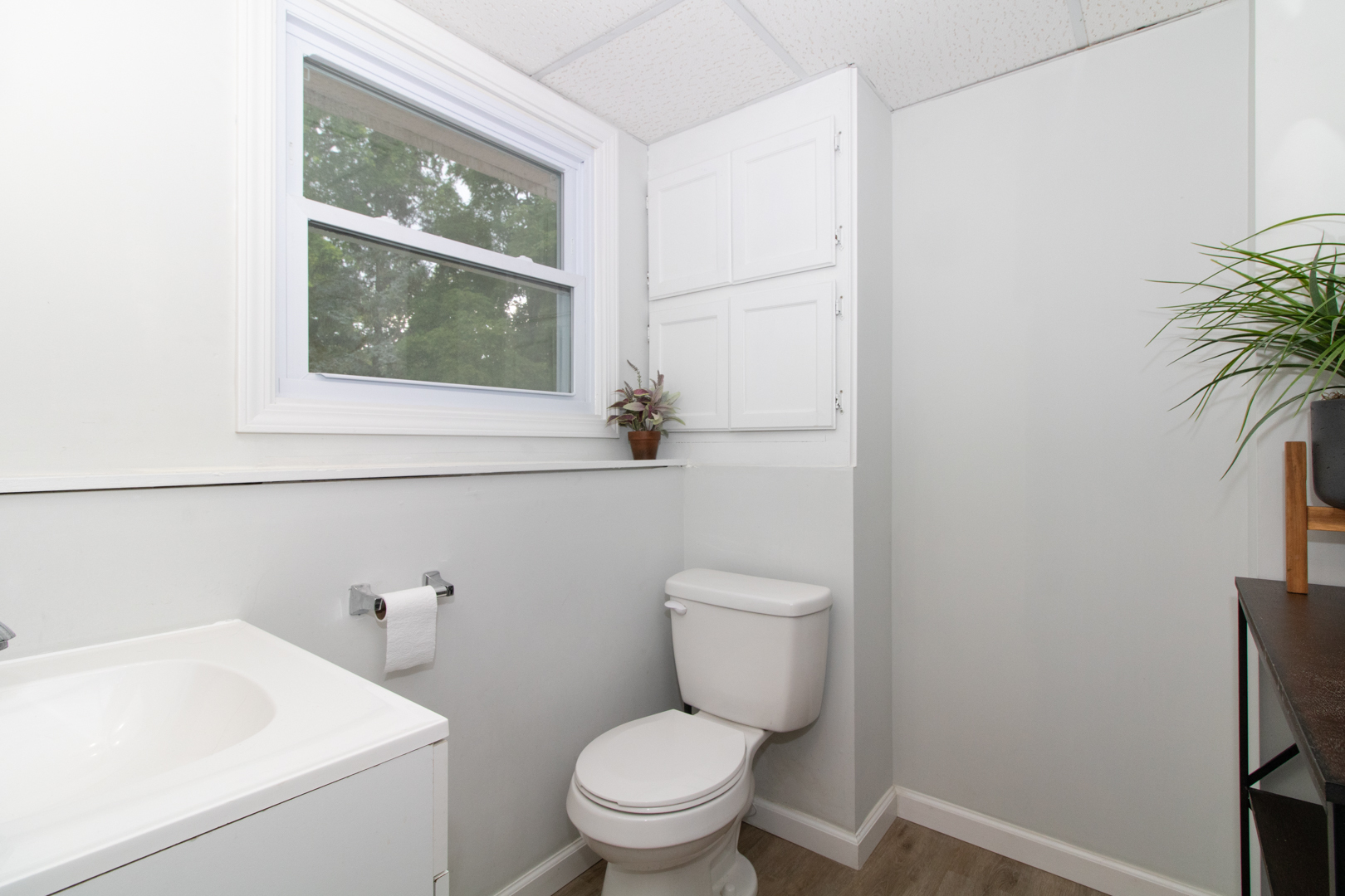 211 Sandra Lane Normal, IL 61761 - Photo 34 of 44 a bathroom with a toilet and a sink