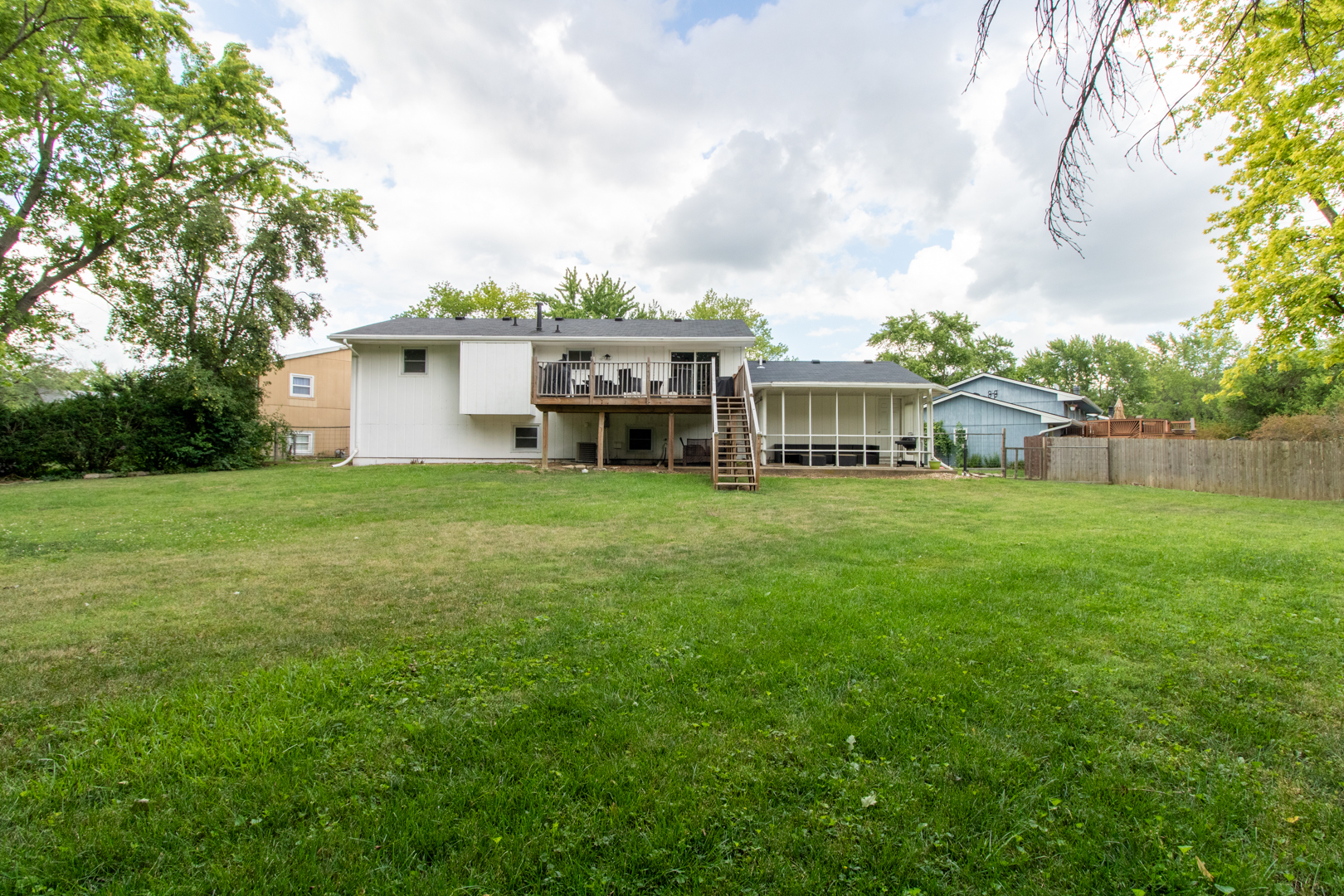 211 Sandra Lane Normal, IL 61761 - Photo 39 of 44 a view of a house with a yard and sitting area