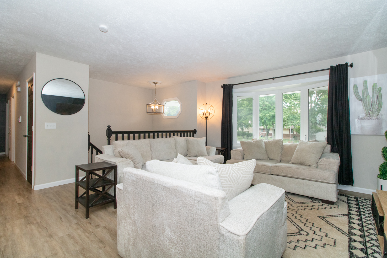 211 Sandra Lane Normal, IL 61761 - Photo 9 of 44 a living room with furniture and a large window