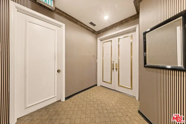 a view of entryway with a front door