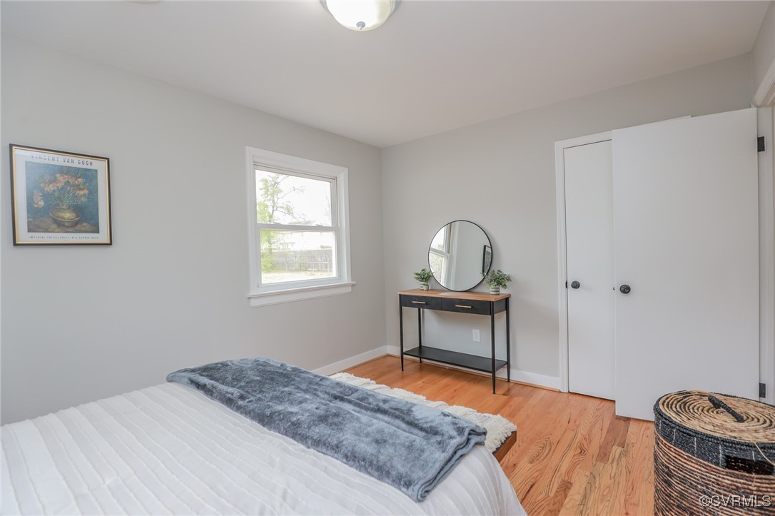 6626 Willson Road Henrico, VA 23231 - Photo 20 of 43 a bedroom with a bed and a table in it