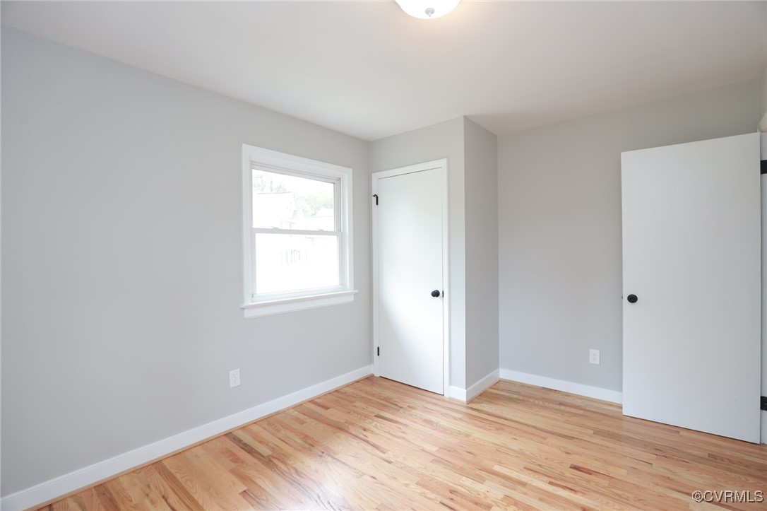 6626 Willson Road Henrico, VA 23231 - Photo 27 of 43 a view of an empty room with wooden floor and a window