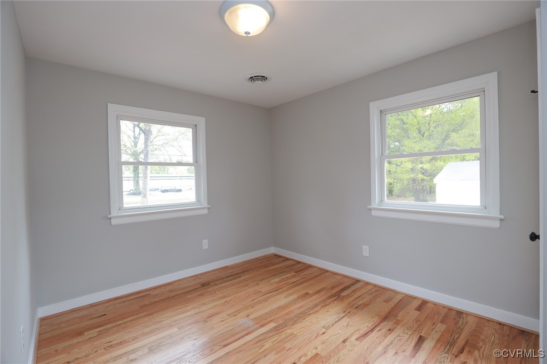6626 Willson Road Henrico, VA 23231 - Photo 33 of 43 a view of empty room with wooden floor