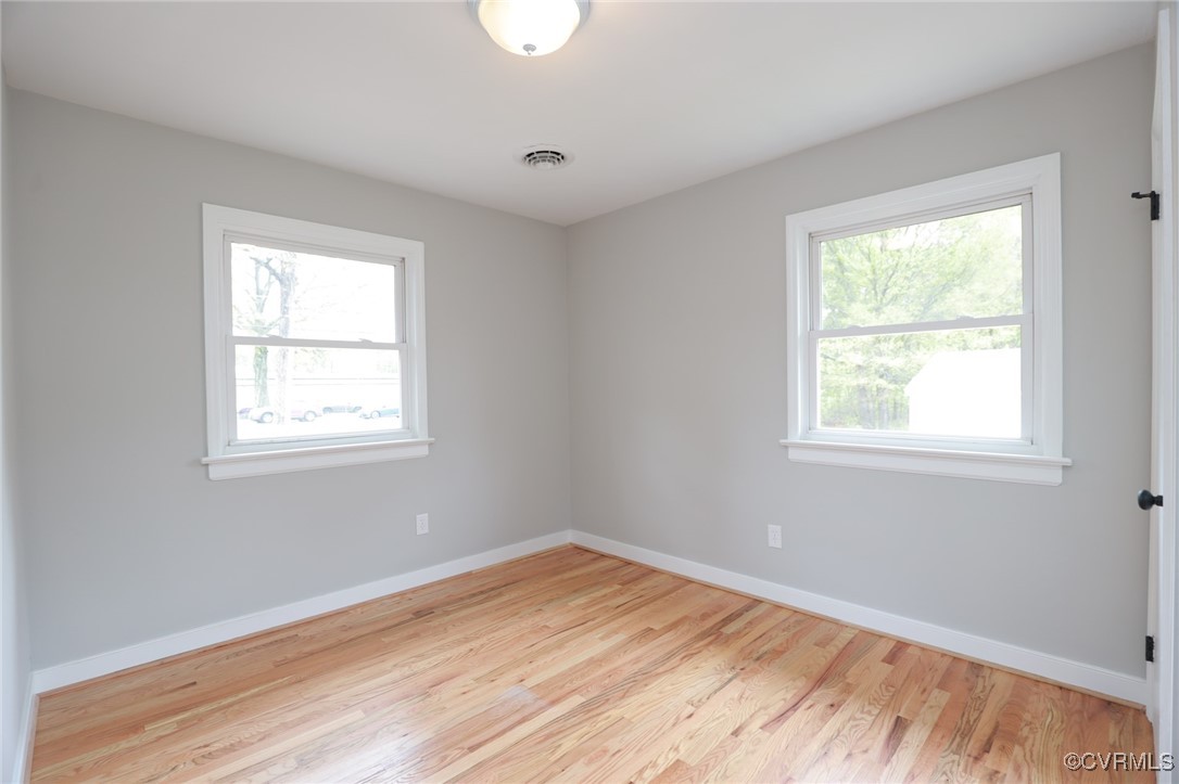 6626 Willson Road Henrico, VA 23231 - Photo 35 of 43 a view of a room with wooden floor and windows