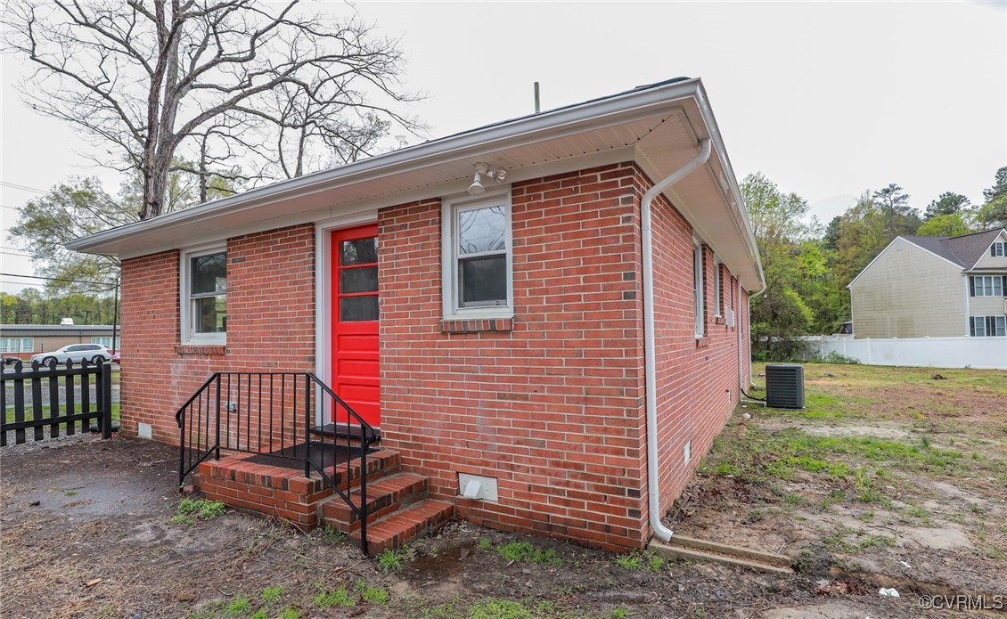 6626 Willson Road Henrico, VA 23231 - Photo 42 of 43 a front view of a house with a yard
