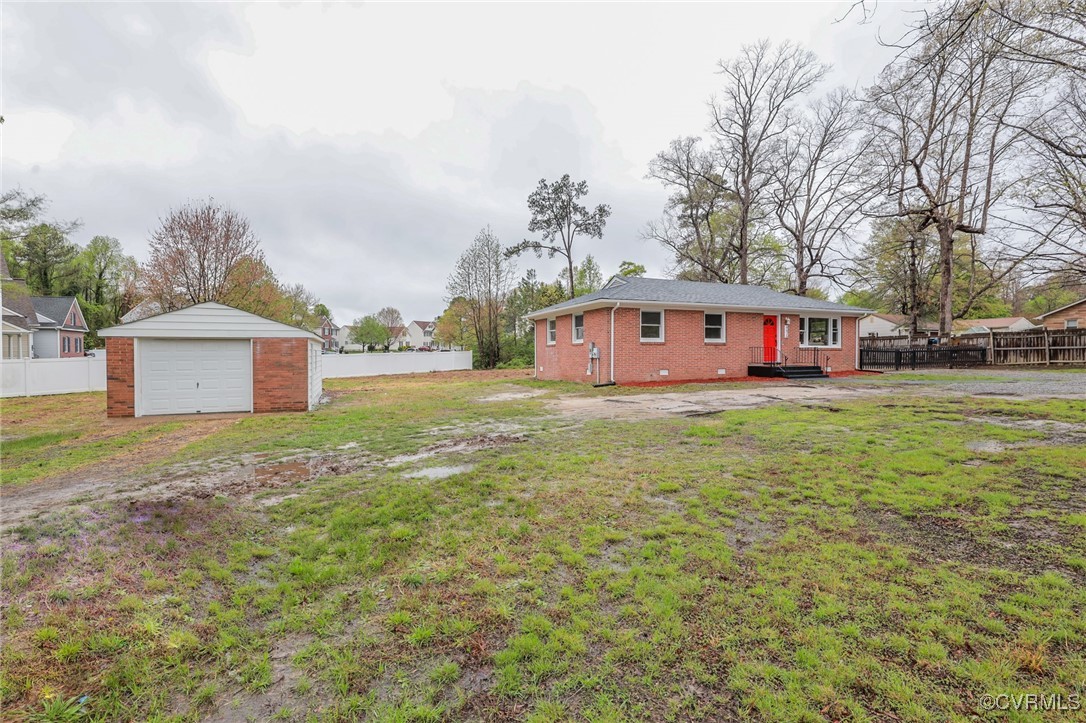 6626 Willson Road Henrico, VA 23231 - Photo 43 of 43 a view of a big yard next to a building with large trees