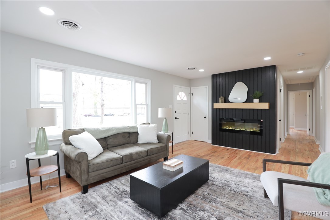 6626 Willson Road Henrico, VA 23231 - Photo 8 of 43 a living room with furniture and a fireplace