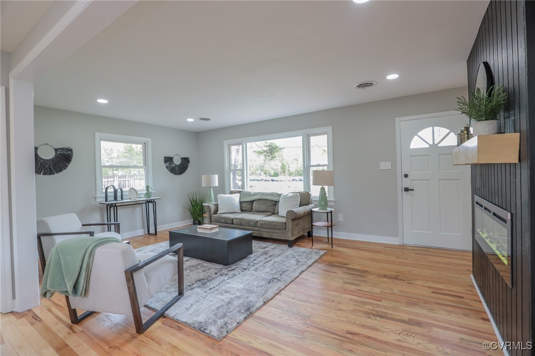6626 Willson Road Henrico, VA 23231 - Photo 10 of 43 a living room with furniture wooden floor and a large window