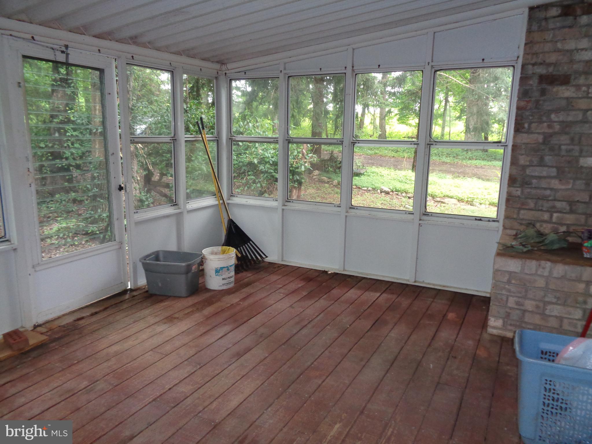 4700 Babylon Road Taneytown, MD 21787 - Photo 15 of 50 Enclosed porch off of dining room