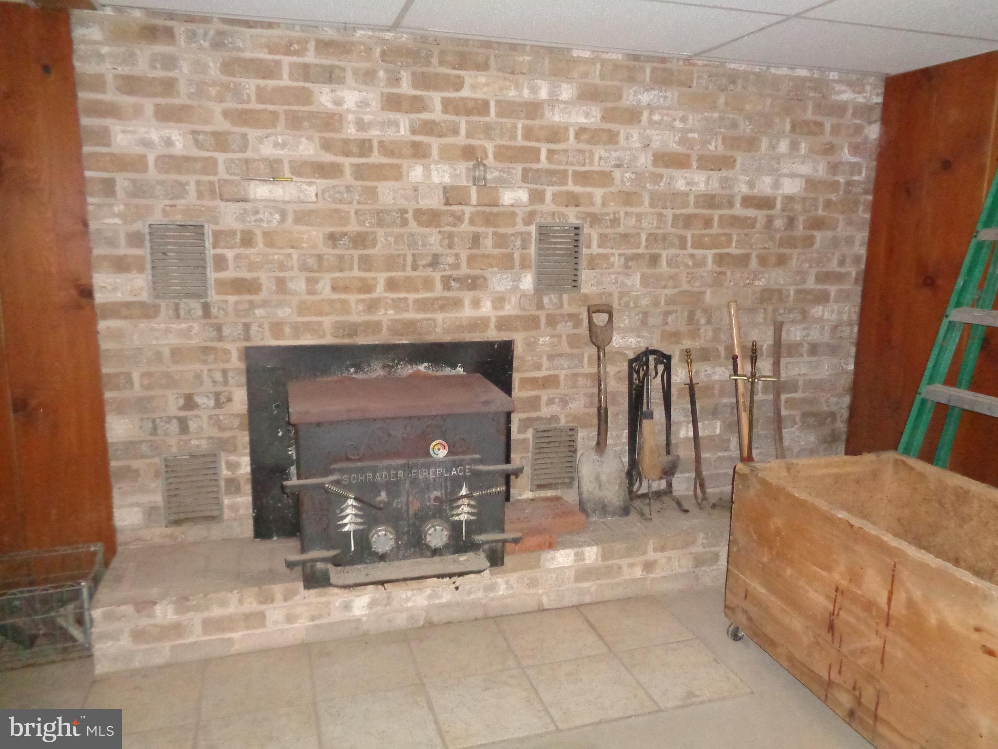 4700 Babylon Road Taneytown, MD 21787 - Photo 24 of 50 Wood stove in basement conveys