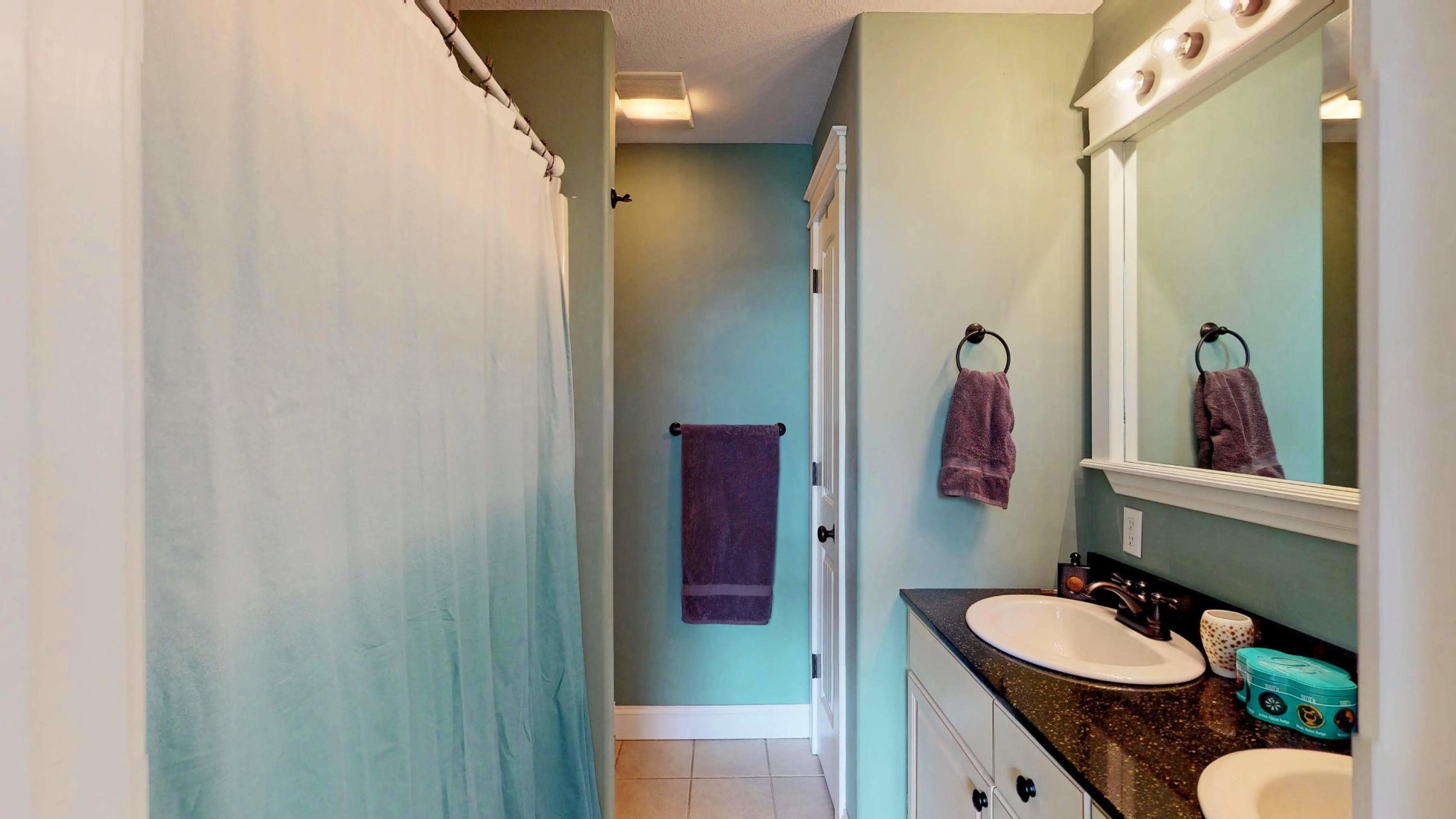2797 Musser Road Morristown, TN 37813 - Photo 13 of 33 a bathroom with a granite countertop sink and a mirror