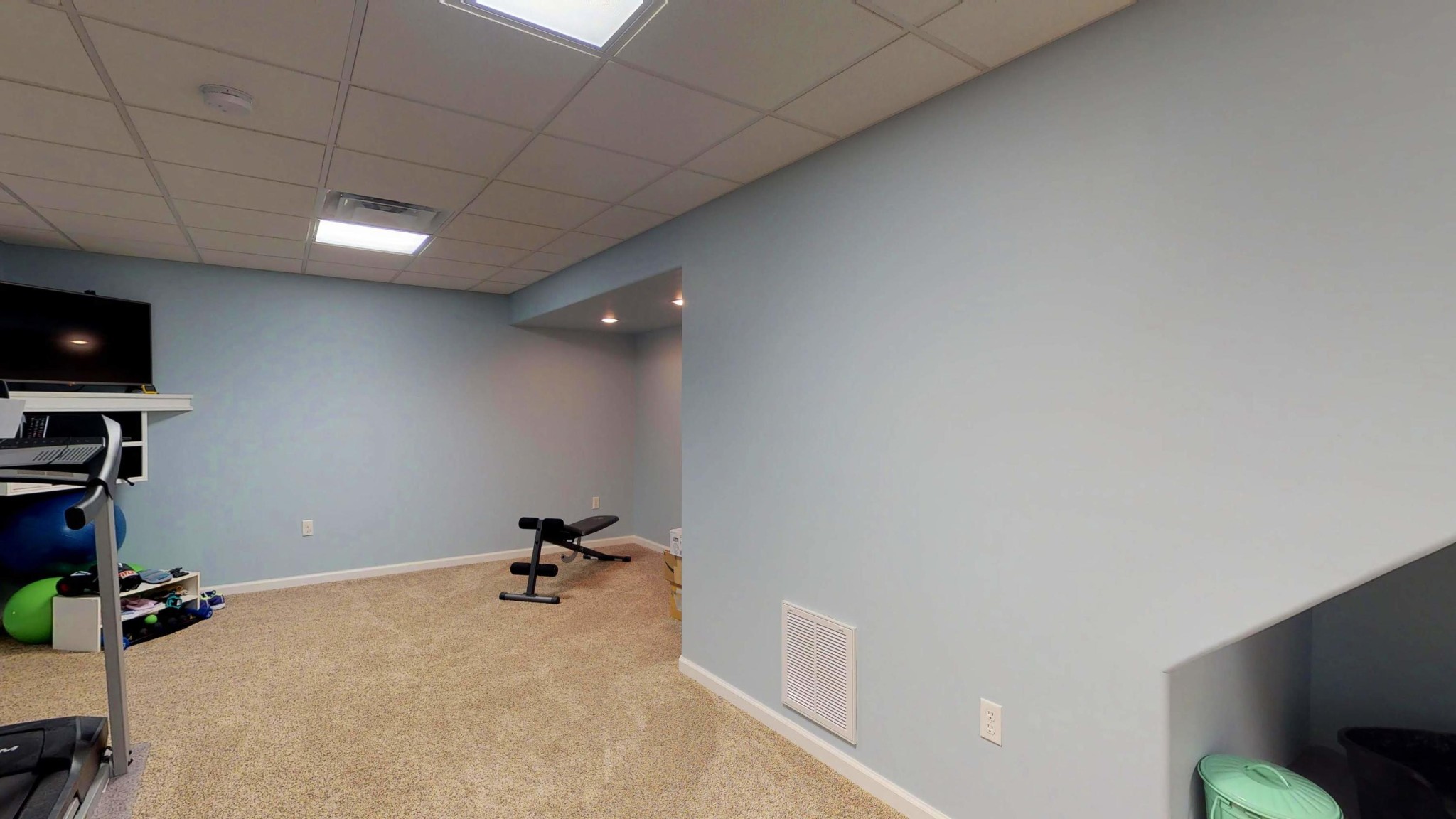 2797 Musser Road Morristown, TN 37813 - Photo 19 of 33 a view of a room with gym equipment and a flat screen tv