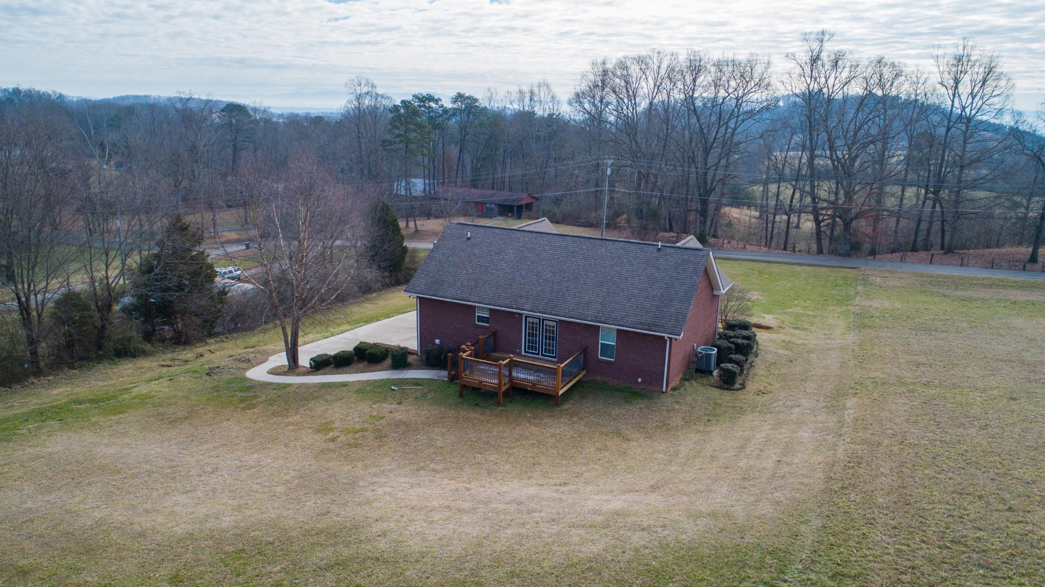 2797 Musser Road Morristown, TN 37813 - Photo 23 of 33 a view of a backyard with a small cabin