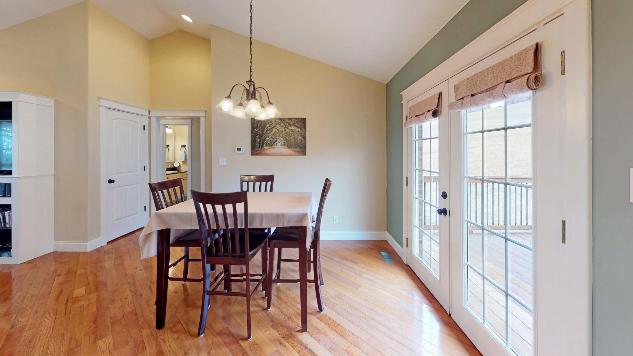 2797 Musser Road Morristown, TN 37813 - Photo 6 of 33 a dining room with furniture a chandelier and wooden floor