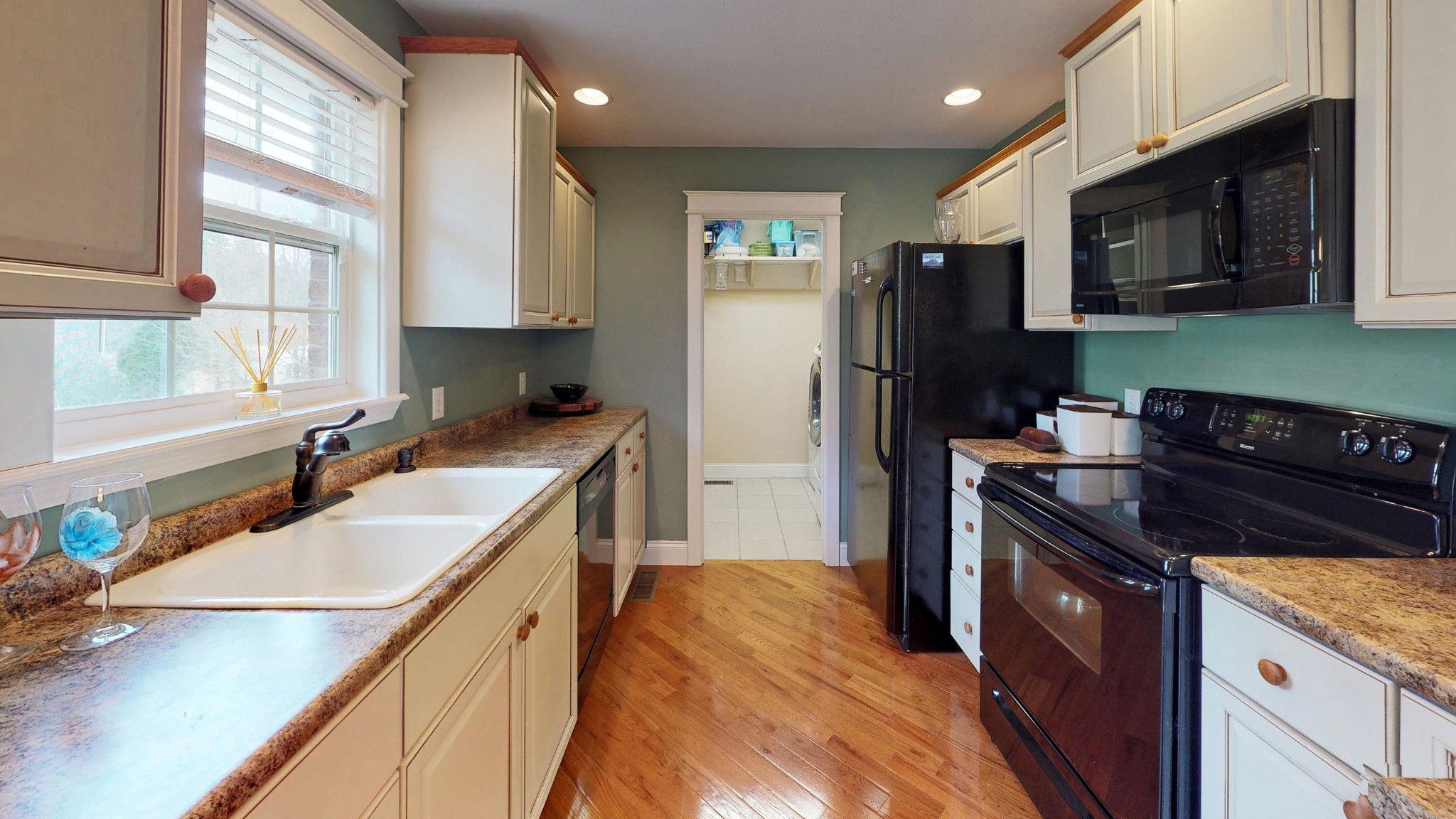 2797 Musser Road Morristown, TN 37813 - Photo 7 of 33 a kitchen with a sink stove top oven and refrigerator