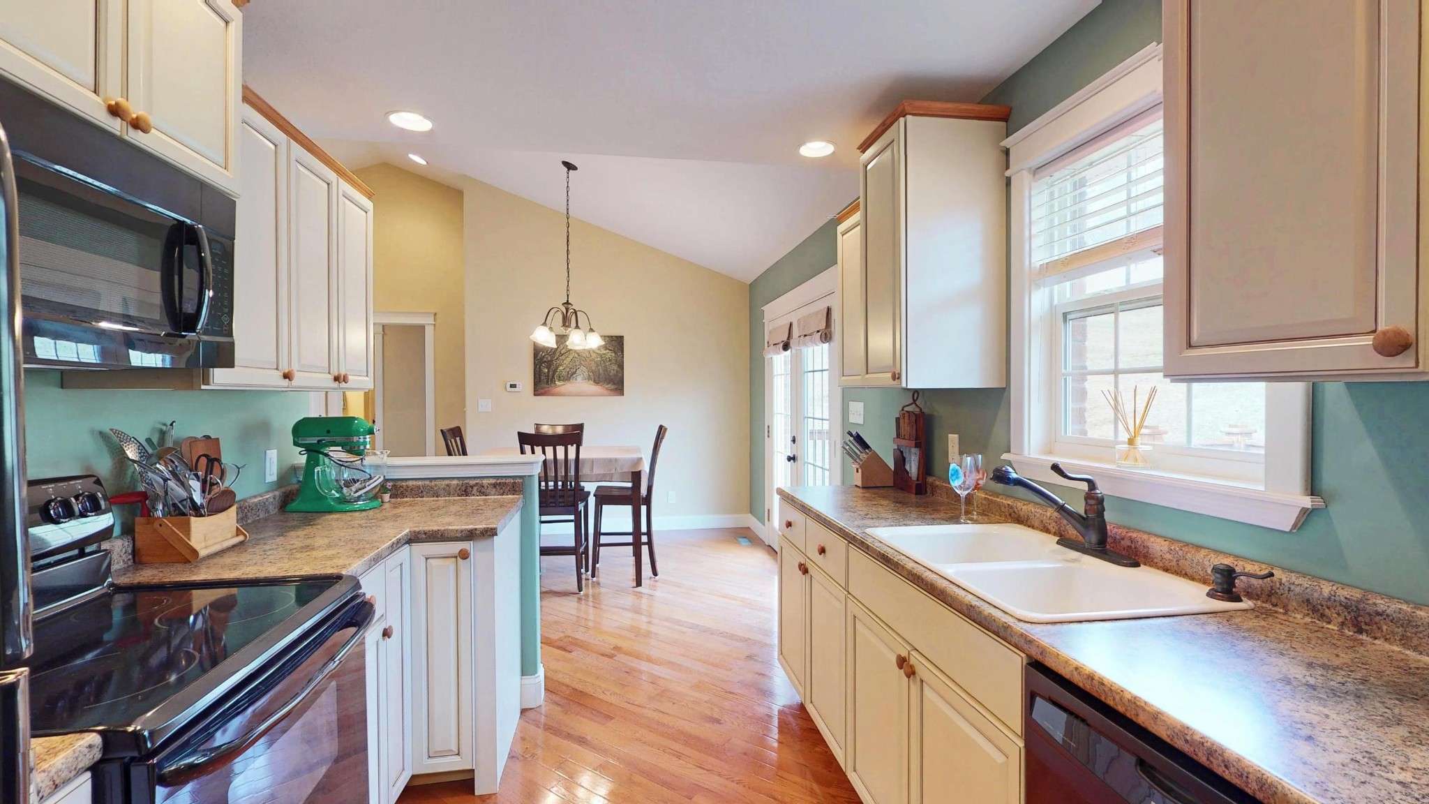 2797 Musser Road Morristown, TN 37813 - Photo 8 of 33 a kitchen with a sink stove and cabinets