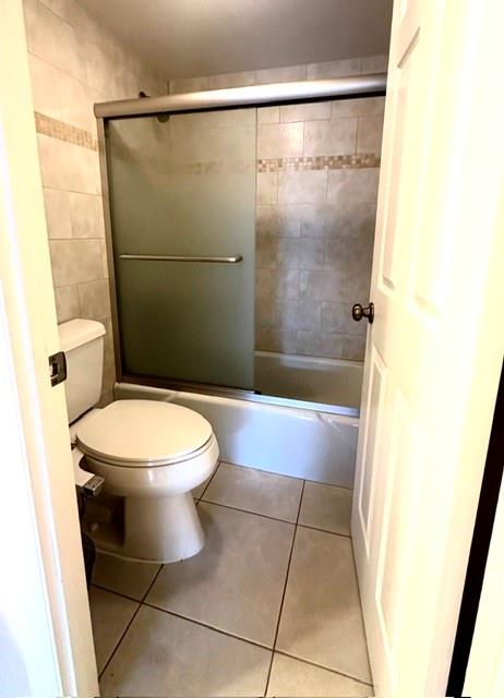 10777 West Sample Road, Unit 418 Coral Springs, FL 33065 - Photo 15 of 21 a bathroom with a toilet and a shower