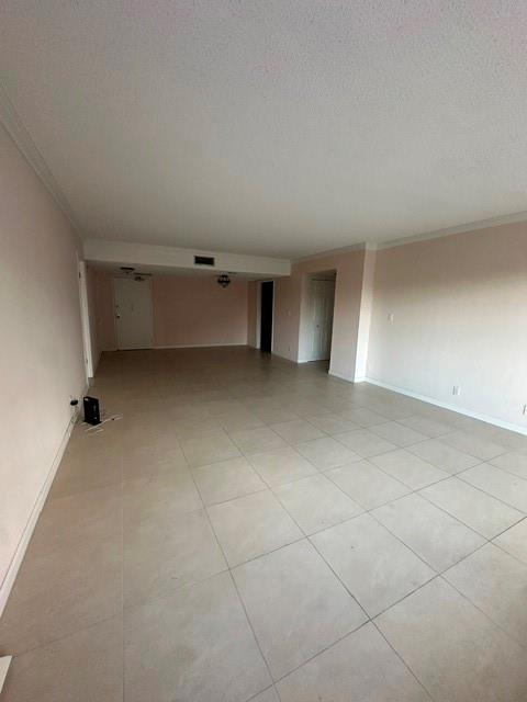 10777 West Sample Road, Unit 418 Coral Springs, FL 33065 - Photo 5 of 21 a view of an empty room with a window