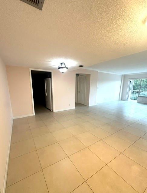10777 West Sample Road, Unit 418 Coral Springs, FL 33065 - Photo 9 of 21 a view of a livingroom with an empty space