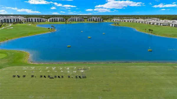 a view of a swimming pool and lake view