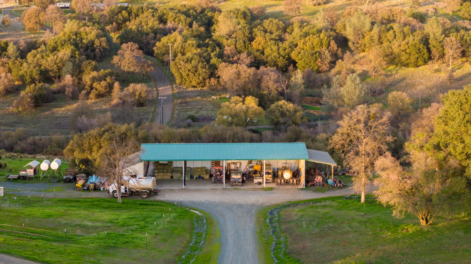 20839 Bear Hollow Road Grass Valley, CA 95949 - Photo 4 of 44 4 bay 71’ x 31’ with 12’ covered overhang on one side + enclosed shop space on the other