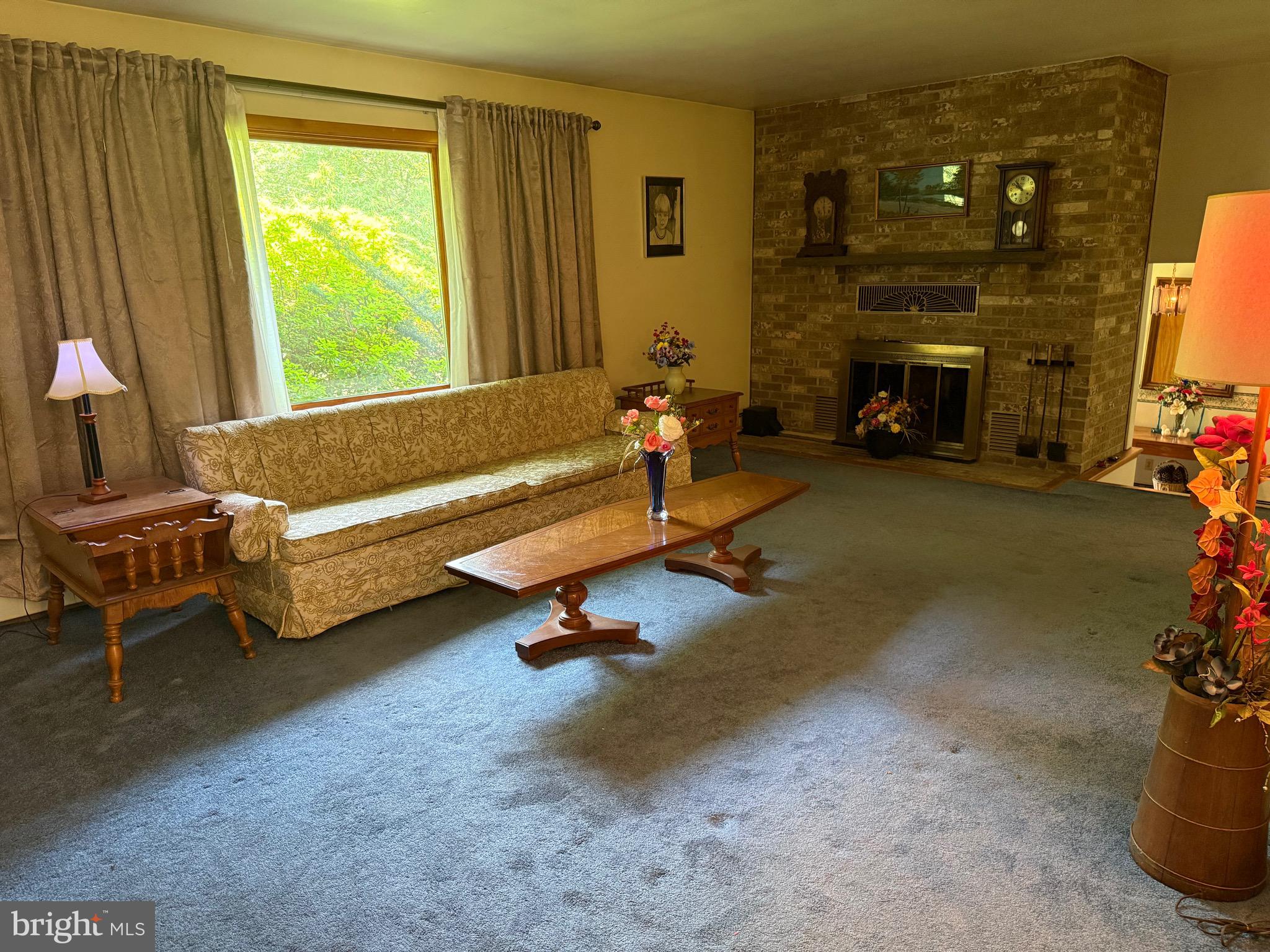 4050 Grande View Drive Pylesville, MD 21132 - Photo 15 of 40 a living room with furniture and a fireplace
