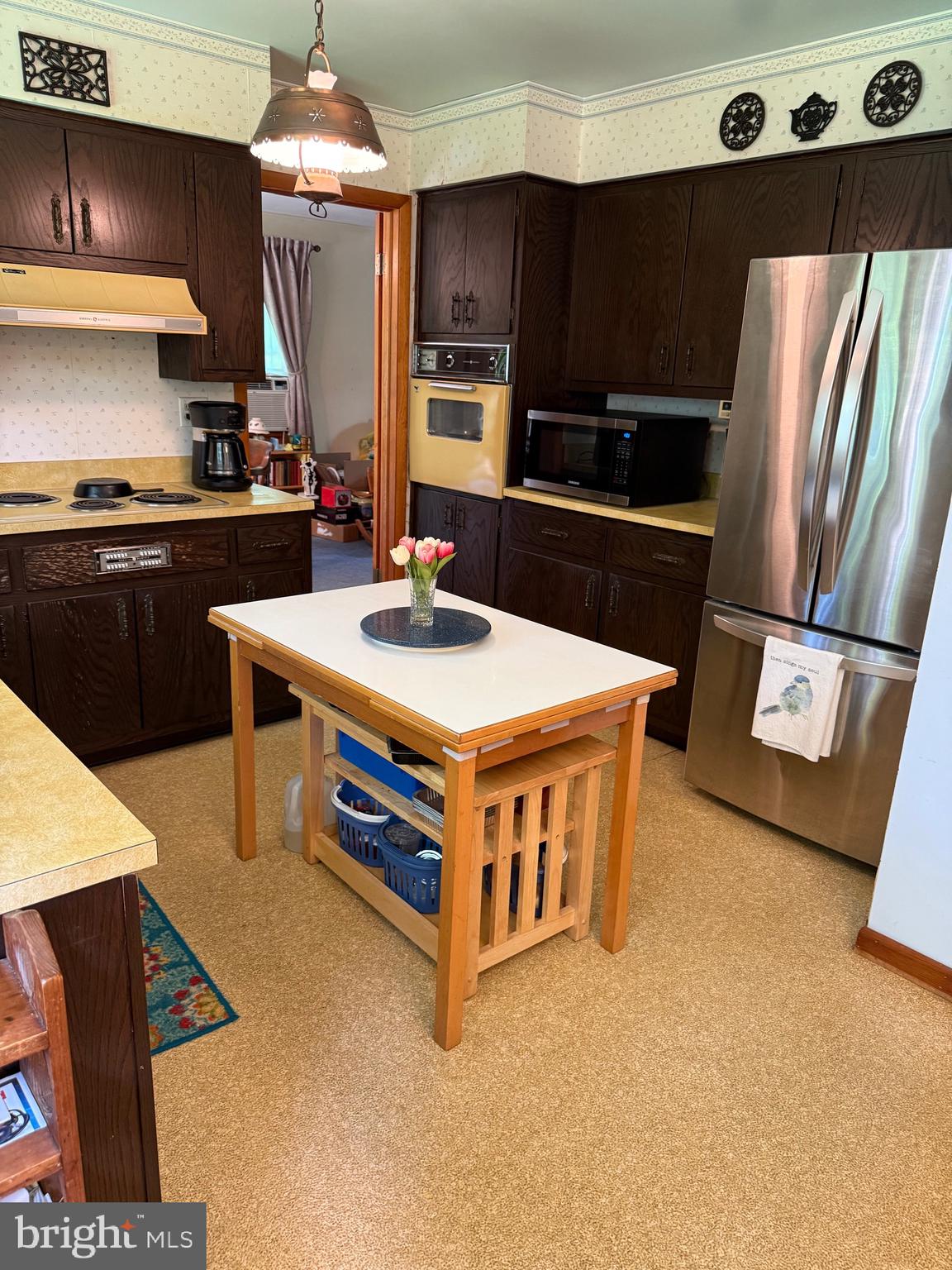 4050 Grande View Drive Pylesville, MD 21132 - Photo 20 of 40 a kitchen with stainless steel appliances granite countertop a stove and a refrigerator