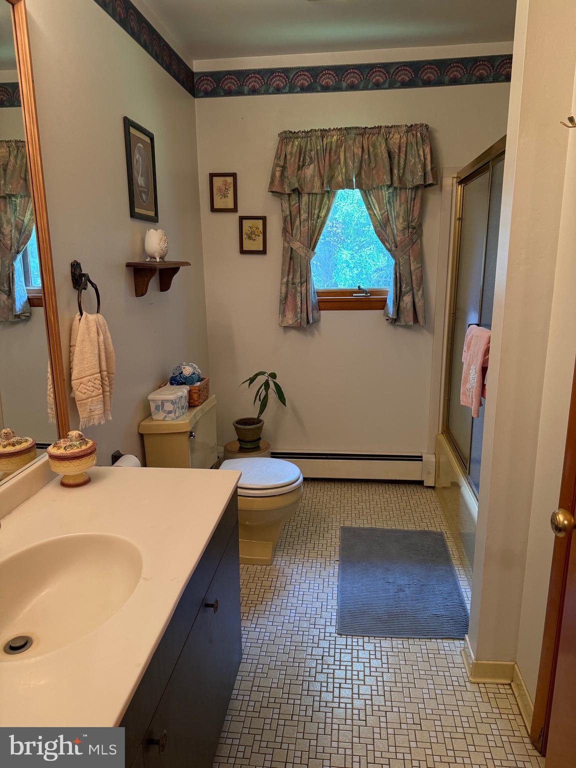 4050 Grande View Drive Pylesville, MD 21132 - Photo 25 of 40 a bathroom with a sink and a mirror