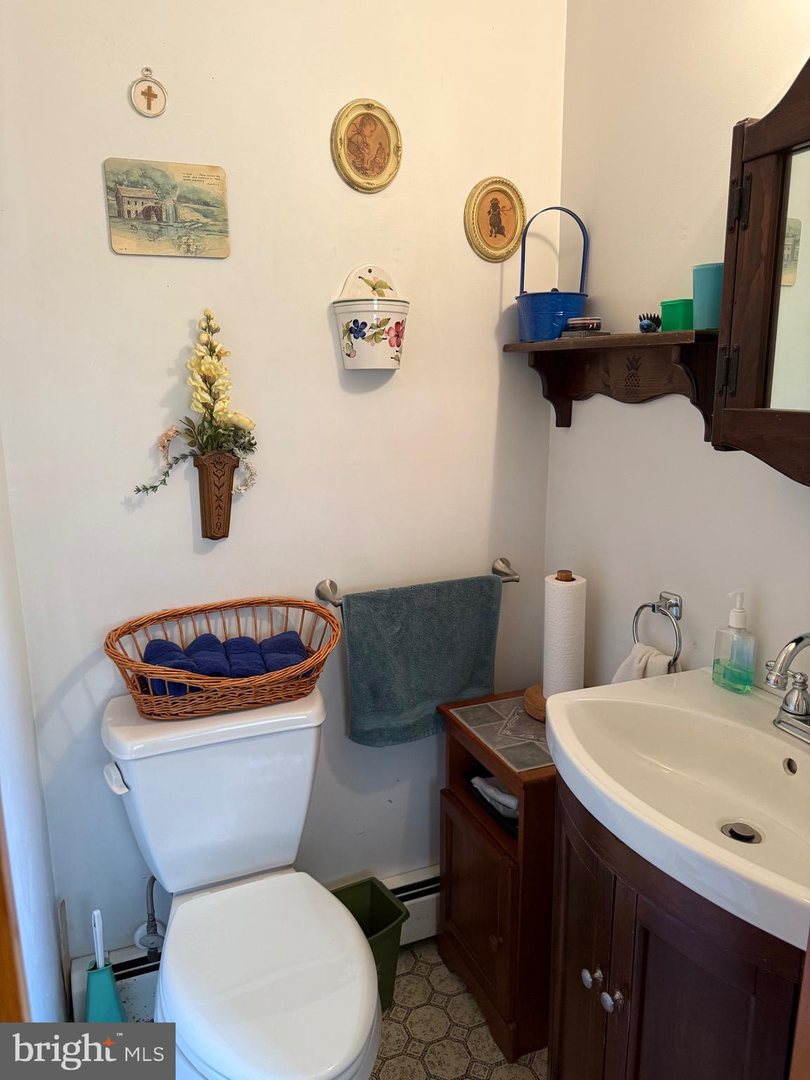 4050 Grande View Drive Pylesville, MD 21132 - Photo 30 of 40 a white toilet sitting next to a bathroom sink