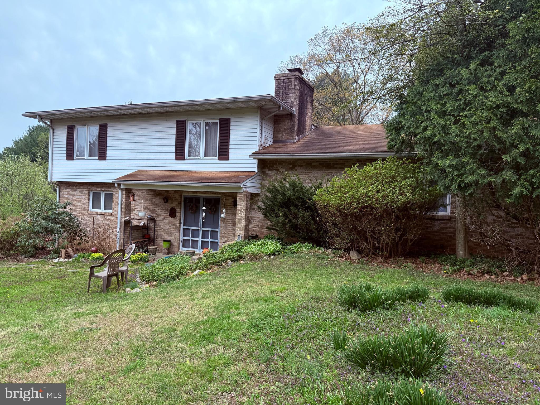 4050 Grande View Drive Pylesville, MD 21132 - Photo 3 of 40 a view of a house with a yard and sitting area