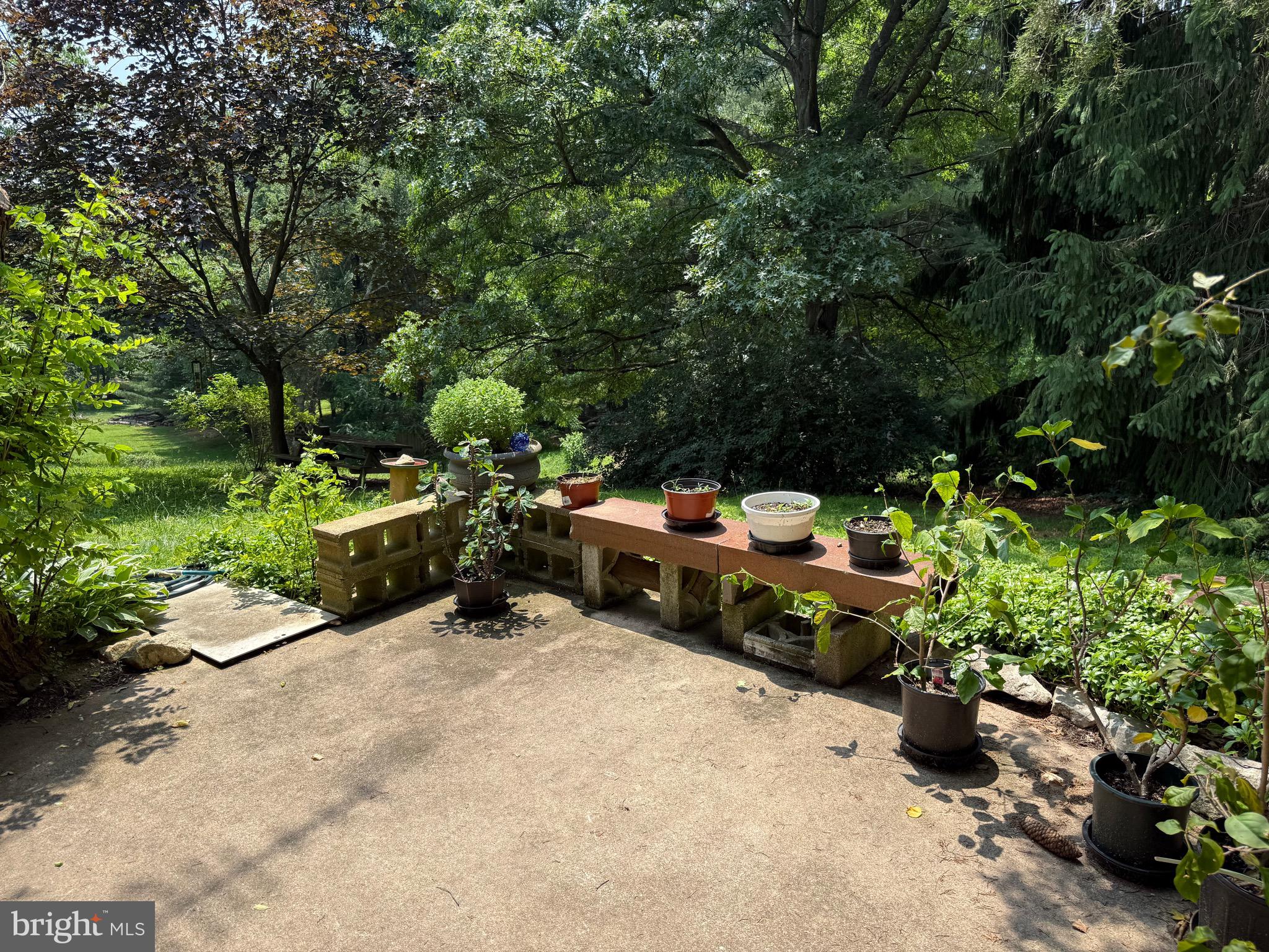 4050 Grande View Drive Pylesville, MD 21132 - Photo 34 of 40 a wooden bench sitting in the middle of a yard