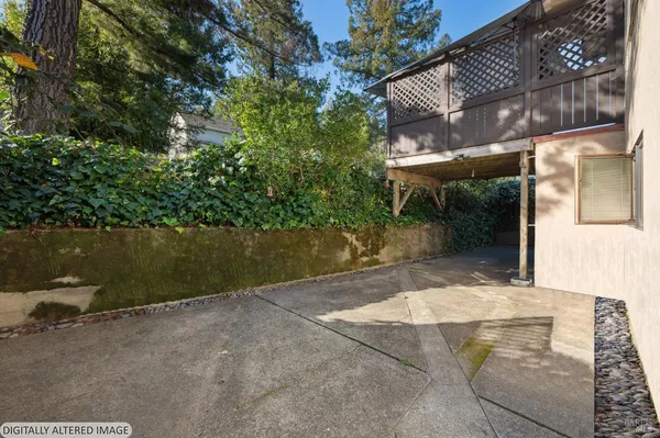 a view of a backyard with pathway