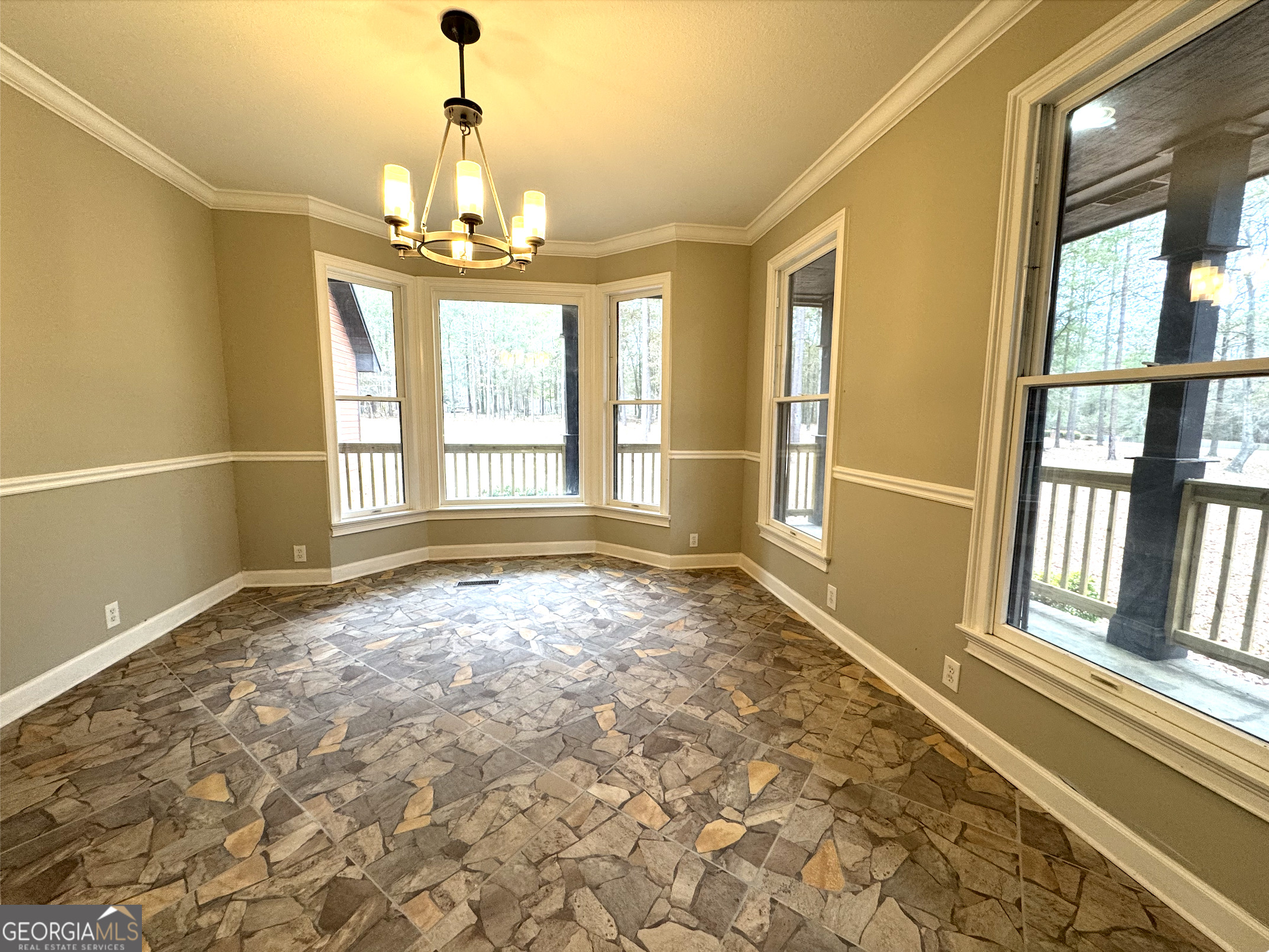 1206 Jasmine Road Dublin, GA 31021 - Photo 22 of 33 a view of an empty room with a window