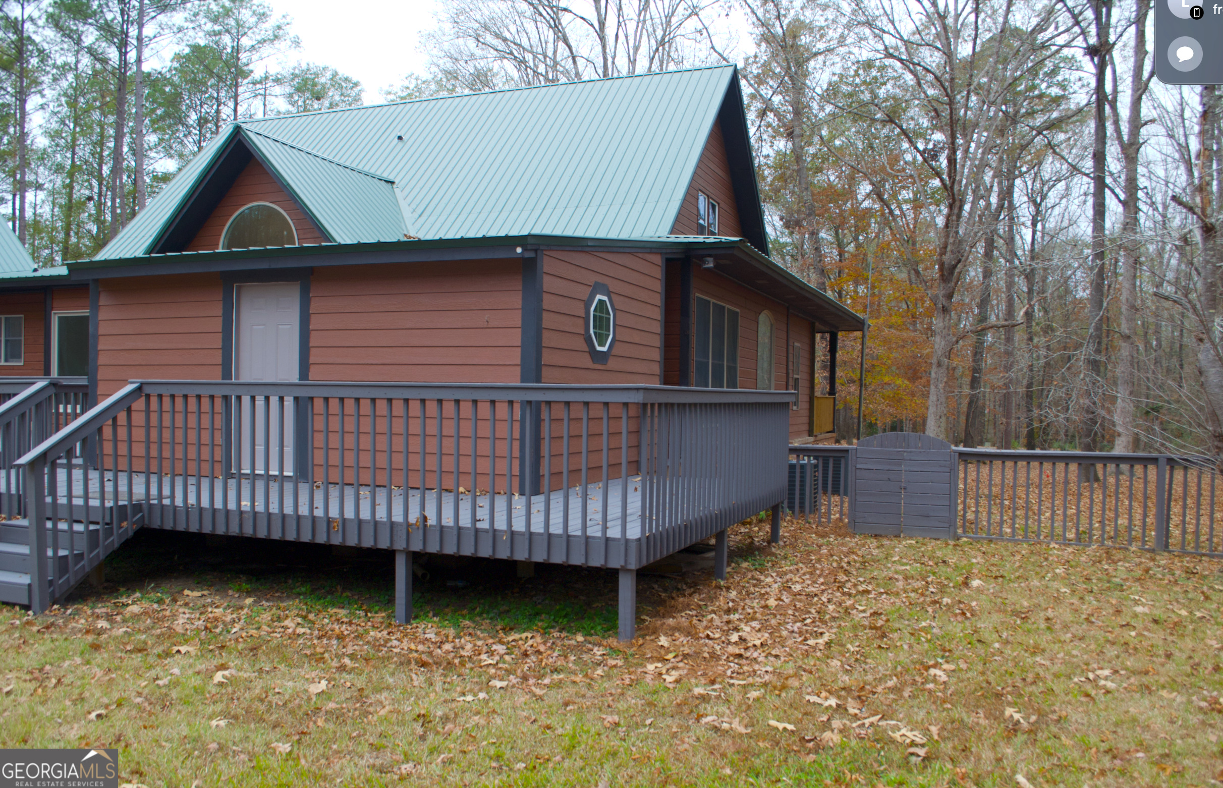 1206 Jasmine Road Dublin, GA 31021 - Photo 5 of 33 a front view of a house with garden